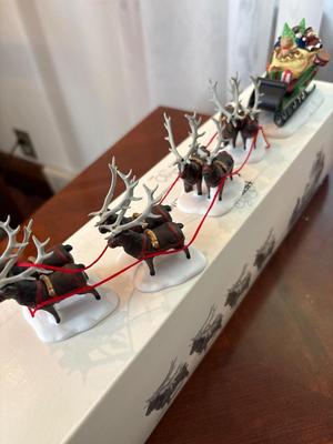 Department 56 Santa and eight reindeer’s and Mr. and Mrs. Claus