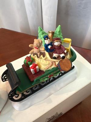 Department 56 Santa and eight reindeer’s and Mr. and Mrs. Claus