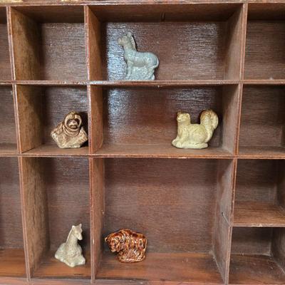 LOT 150F: Wooden Display Shelf with Multiple Red Rose Wade Figurines