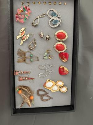 Sale Photo Thumbnail #249: This light has fun Vintage earrings. There’s some big chunky earrings some smaller, beautiful little earrings a lot of 80s style going on here.