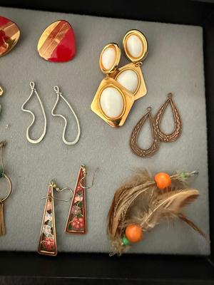 Sale Photo Thumbnail #250: This light has fun Vintage earrings. There’s some big chunky earrings some smaller, beautiful little earrings a lot of 80s style going on here.