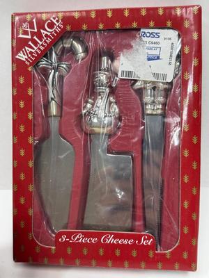 Sale Photo Thumbnail #351: New, in original boxes. Christmas-themed napkin rings.