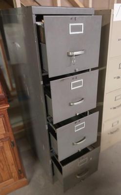 FOUR DRAWER METAL FILING CABINET