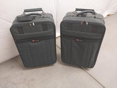 TWO ATLANTIC FOUR WHEELED SUITCASES