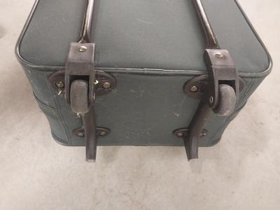 TWO ATLANTIC FOUR WHEELED SUITCASES