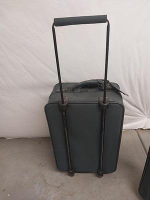 TWO ATLANTIC FOUR WHEELED SUITCASES