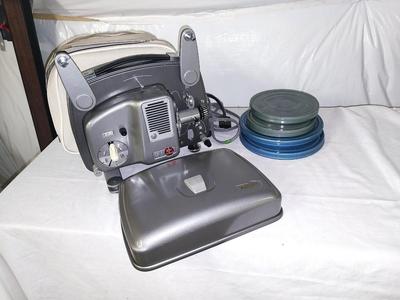 VINTAGE PORTABLE BOLEX 18-5 PROJECTOR WITH FILM IN CASES