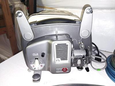 VINTAGE PORTABLE BOLEX 18-5 PROJECTOR WITH FILM IN CASES