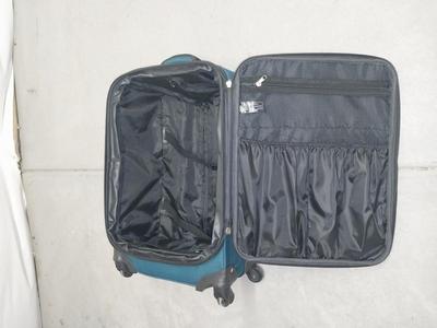 FOUR WHEELED LEISURE LUGGAGE WITH PULL HANDLE