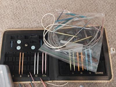 KNITTING NEEDLES AND KNITTING BOOKS