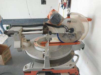 RIDGID DUEL BEVEL SLIDING MITER SAW ON MOBIL STAND