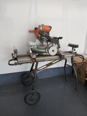 RIDGID DUEL BEVEL SLIDING MITER SAW ON MOBIL STAND