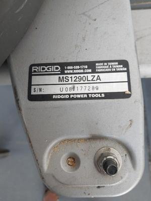 RIDGID DUEL BEVEL SLIDING MITER SAW ON MOBIL STAND