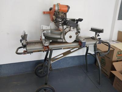 RIDGID DUEL BEVEL SLIDING MITER SAW ON MOBIL STAND