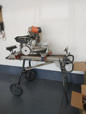 RIDGID DUEL BEVEL SLIDING MITER SAW ON MOBIL STAND