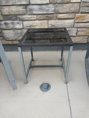 TWO RESIN CHAIRS AND SMALL RESIN TABLE WITH CUSHIONS