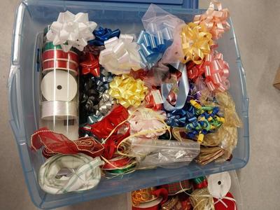 CONTAINER OF BOWS AND RIBBONS