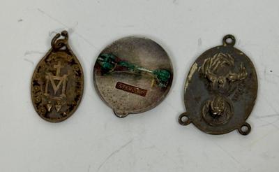 Sale Photo Thumbnail #107: 15 Year service pin for St. Joseph's Hospital, Sterling Silver Madonna medallion (2.6gh), and a Miraculous Medal from France.