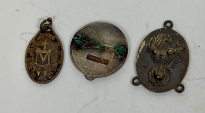 Sale Photo Thumbnail #106: 15 Year service pin for St. Joseph's Hospital, Sterling Silver Madonna medallion (2.6gh), and a Miraculous Medal from France.