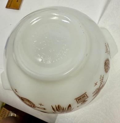 Sale Photo Thumbnail #27: White pyrex mixing bowl with brown Early American images.  Great condition.