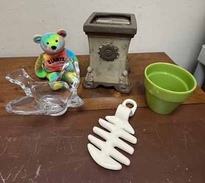 Sale Photo Thumbnail #374: Rainbow bear plush, glass dove spoon rest, square planter, small green pot, and a replacement insert for a bacon maker by Louisville Stoneware.