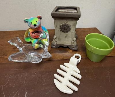 Sale Photo Thumbnail #373: Rainbow bear plush, glass dove spoon rest, square planter, small green pot, and a replacement insert for a bacon maker by Louisville Stoneware.
