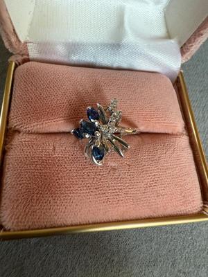 Sale Photo Thumbnail #346: This is for a ladies 14 karat white gold ring mounting, mounted with four Marquise cut genuine sapphires weighing approximately 0.12 carrots each and five single cut diamonds weigh approximately 0.01 carrots each..