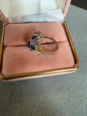Sale Photo Thumbnail #344: This is for a ladies 14 karat white gold ring mounting, mounted with four Marquise cut genuine sapphires weighing approximately 0.12 carrots each and five single cut diamonds weigh approximately 0.01 carrots each..