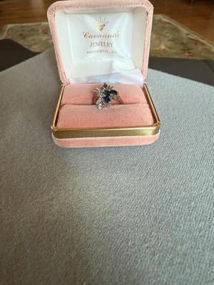 Sale Photo Thumbnail #343: This is for a ladies 14 karat white gold ring mounting, mounted with four Marquise cut genuine sapphires weighing approximately 0.12 carrots each and five single cut diamonds weigh approximately 0.01 carrots each..