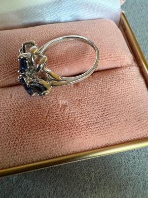 Sale Photo Thumbnail #345: This is for a ladies 14 karat white gold ring mounting, mounted with four Marquise cut genuine sapphires weighing approximately 0.12 carrots each and five single cut diamonds weigh approximately 0.01 carrots each..