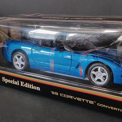LOT 24: Burago 1957 Corvette with (2) Road Tough 1957 Corvettes & a Maisto 1998 Corvette