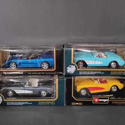 LOT 24: Burago 1957 Corvette with (2) Road Tough 1957 Corvettes & a Maisto 1998 Corvette