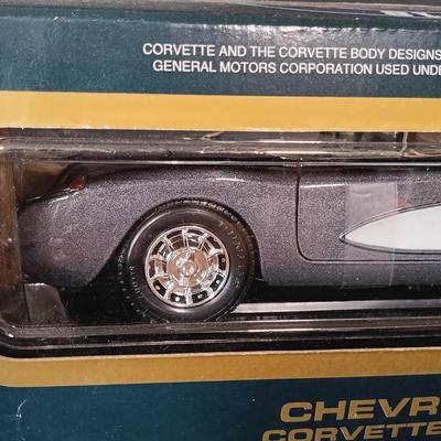 LOT 24: Burago 1957 Corvette with (2) Road Tough 1957 Corvettes & a Maisto 1998 Corvette