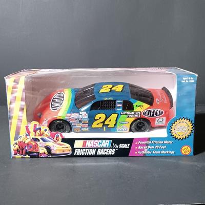 LOT 212: Gay Toys Inc. Pink and Red Fashion Doll Corvettes with Jeff Gordon 1:24 Scale Friction Powered Toy Car