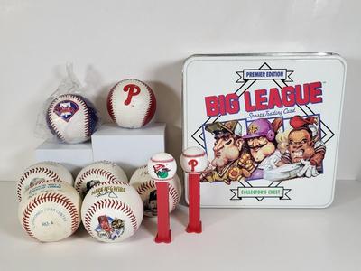 LOT 84: Baseball Memorabilia Lot Including Facsimile Autographs, Baseballs, Rare Big League Collectors Tin and More