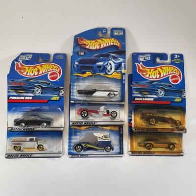 LOT 99: Seven Vintage Hot Wheels Lot Featuring 56' Ford Truck, Porsche 959 and More