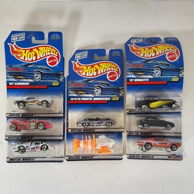 LOT 154: Eight Vintage Hot Wheels Lot Featuring 37' Bugatti, Mercedes SLK and More