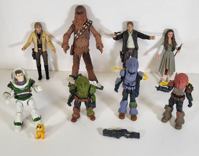 LOT 161: Eight Disney Toy Action Figures Including Characters from Star Wars and Buzz Lightyear