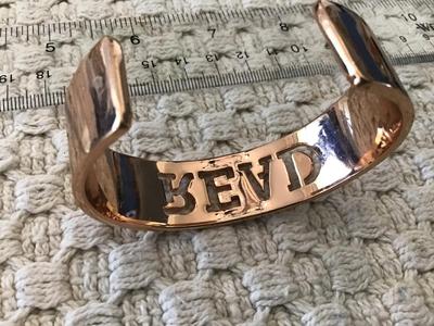 Read Bracelet. New. Rose Tone