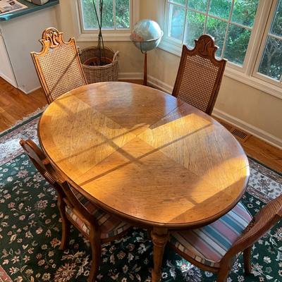 K755 Drexel Dining Table With Cane Back Dining Chairs