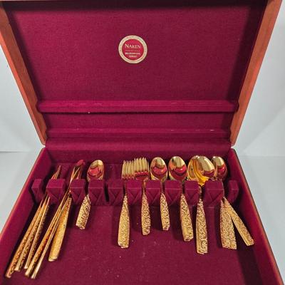 LOT 29D: Naken Gold Flatware Set in Wood Chest