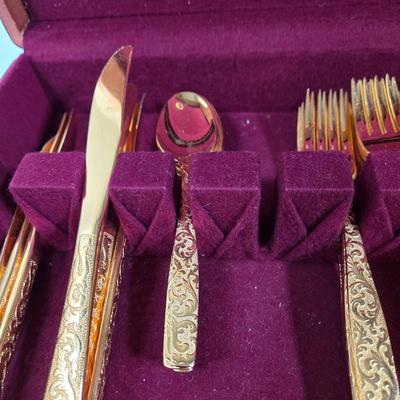 LOT 29D: Naken Gold Flatware Set in Wood Chest
