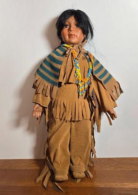 LOT 50X: Set of Four Native American Dolls
