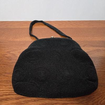 LOT 60X: Collection of Hand Bags Including Snake Skin-Like Bag, Vintage Macrame Wristlet, Black Beaded Bag, and More