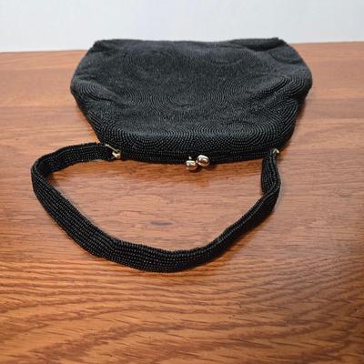 LOT 60X: Collection of Hand Bags Including Snake Skin-Like Bag, Vintage Macrame Wristlet, Black Beaded Bag, and More