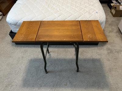 TYPEWRITER TABLE ON METAL CASTERS