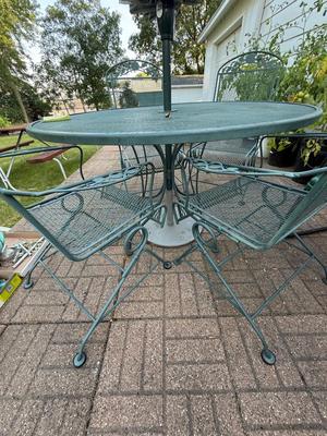 Sale Photo Thumbnail #128: O6-patio table with four chairs and umbrella

Umbrella will need a good cleaning/power wash – see photos