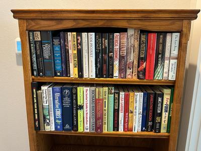 TWO SHELVES OF BOOKS
