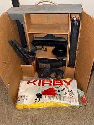 Sale Photo Thumbnail #1099: M18-Kirby vacuum plus attachments