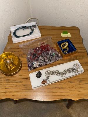 Sale Photo Thumbnail #1144: M5-table plus jewelry